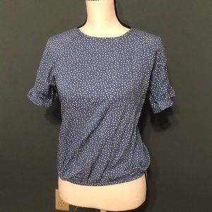 Blue polka dotted shirt